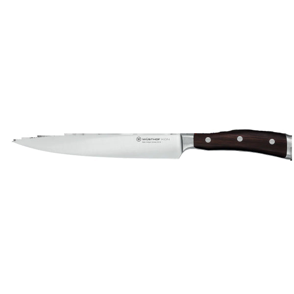 the Wüsthof Classic Ikon Carving Knife Black 20 cm ensures effortless slicing of roasts and large cuts.