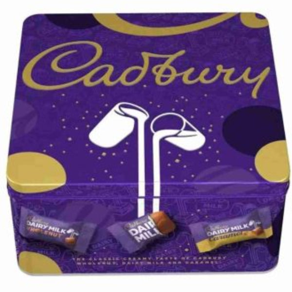 Festive sharing tin packed with assorted Cadbury Dairy Milk chocolate chunks, perfect for gatherings and gifting.