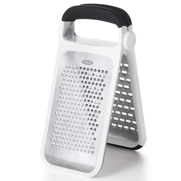 Two-fold etched grater with sharp, durable surfaces for smooth, effortless grating and compact storage.