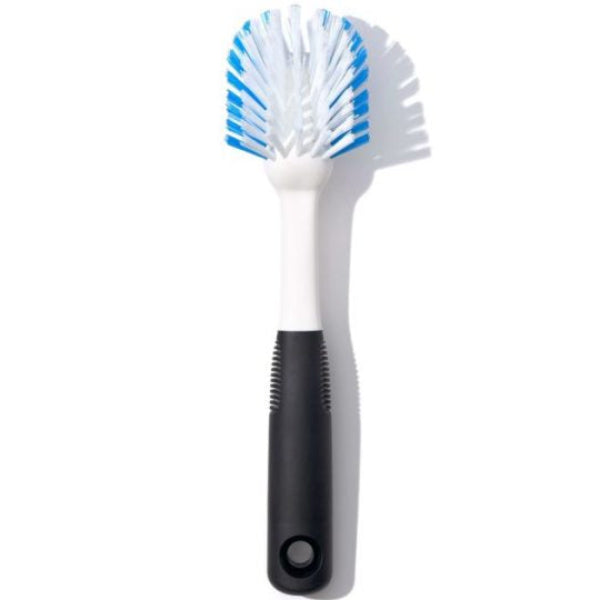 Scrub dishes and surfaces easily with this durable OXO kitchen brush.
