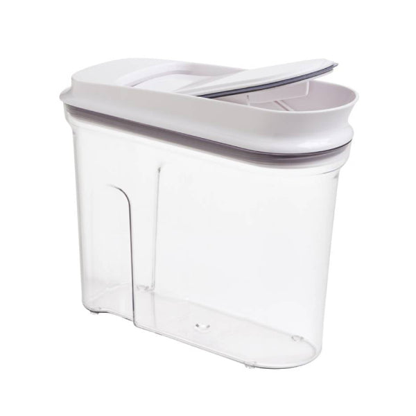 Compact airtight dispenser for keeping cereals fresh and easily accessible.